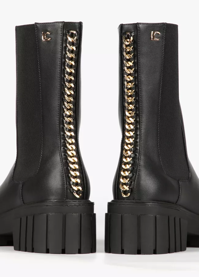 Black ankle boots with chain