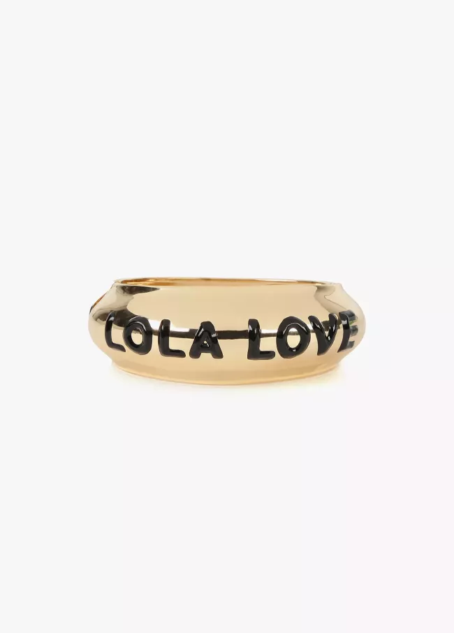 Gold-toned bracelet with slogan