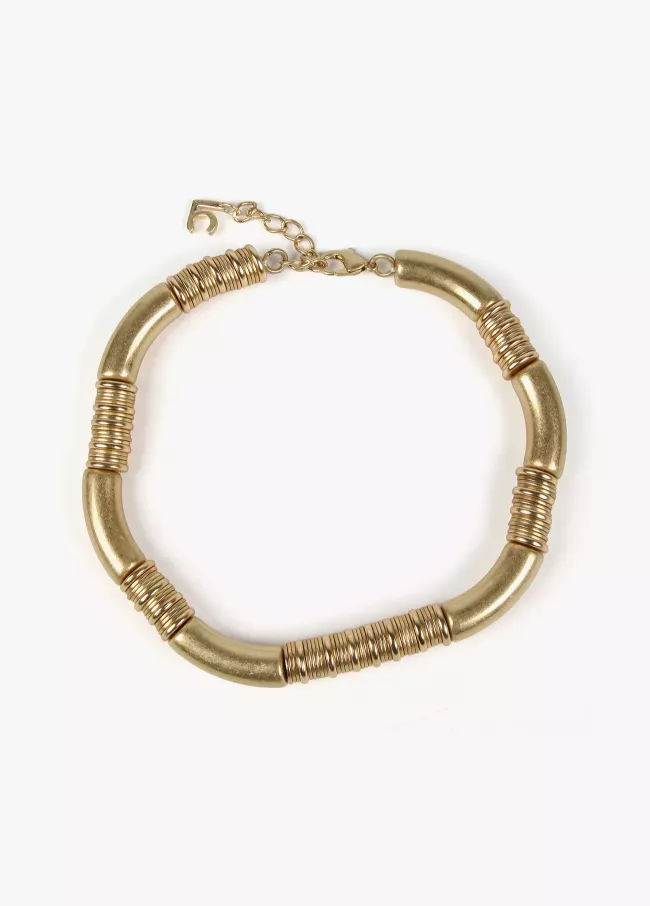 Necklace with gold-toned pieces