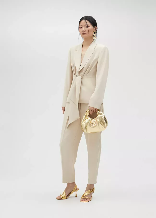 Loose-fitting beige-pink trousers