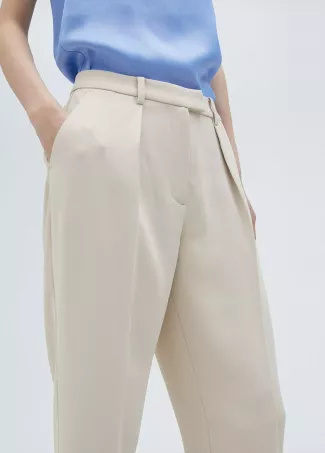 Loose-fitting beige-pink trousers