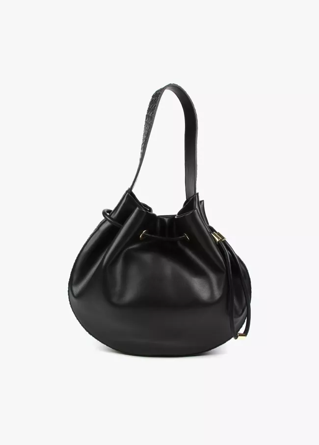 Half-moon bag with braided details