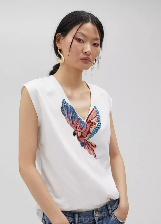 Camiseta pájaro con pedrería