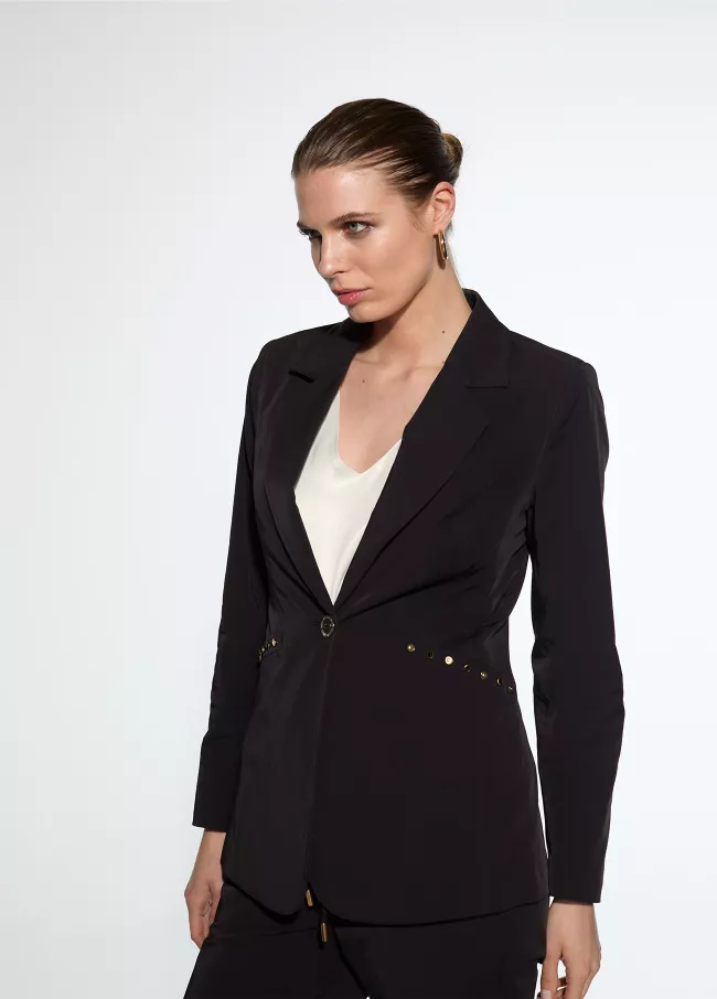 Americana tejido técnico tachas