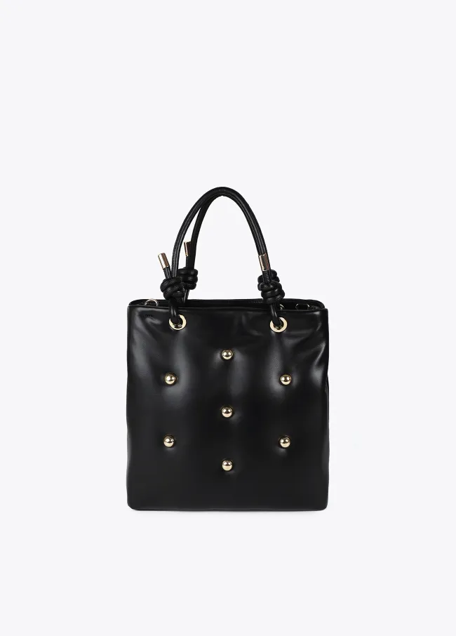Quilted faux leather bag with round XL studs
