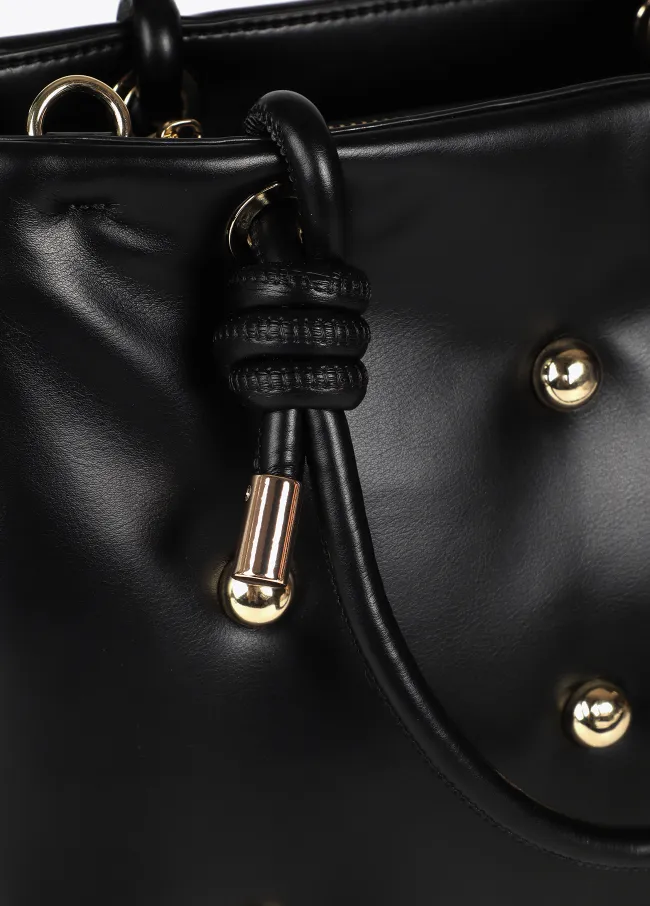 Quilted faux leather bag with round XL studs