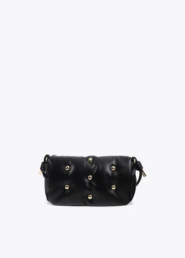 Quilted faux leather crossbody bag with round...
