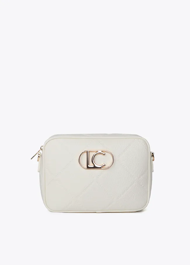Faux leather crossbody bag with diamond design...