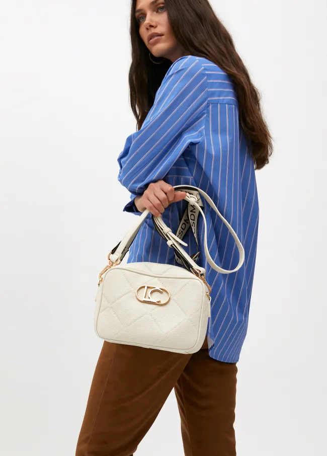 Faux leather crossbody bag with diamond design...