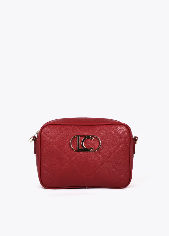 Faux leather crossbody bag with diamond design...