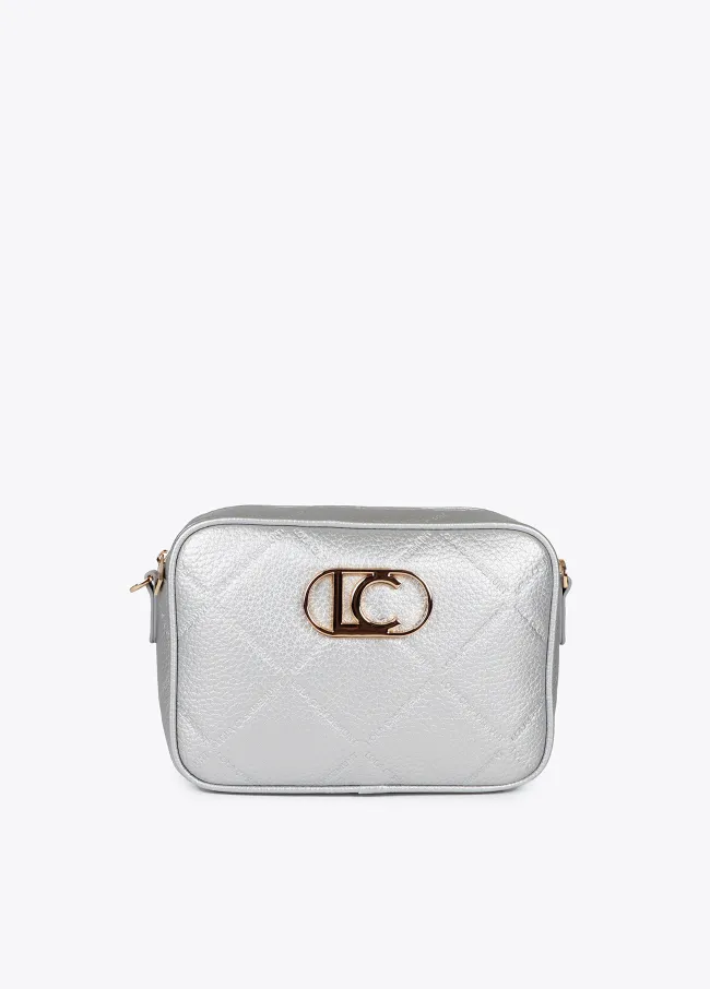 Faux leather crossbody bag with diamond design...