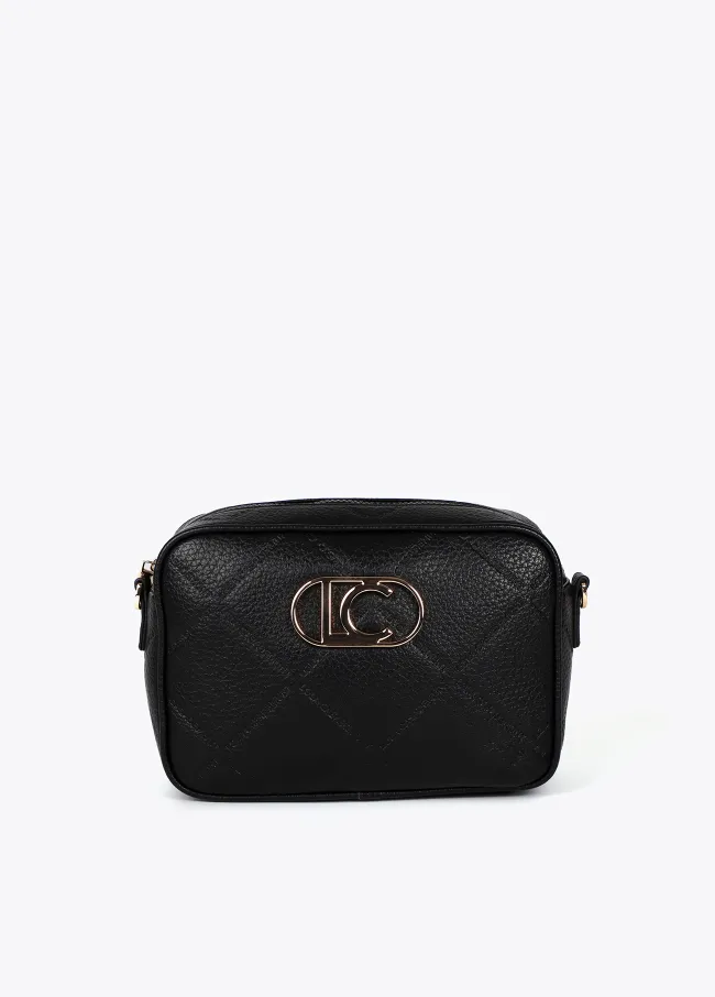 Faux leather crossbody bag with diamond design...