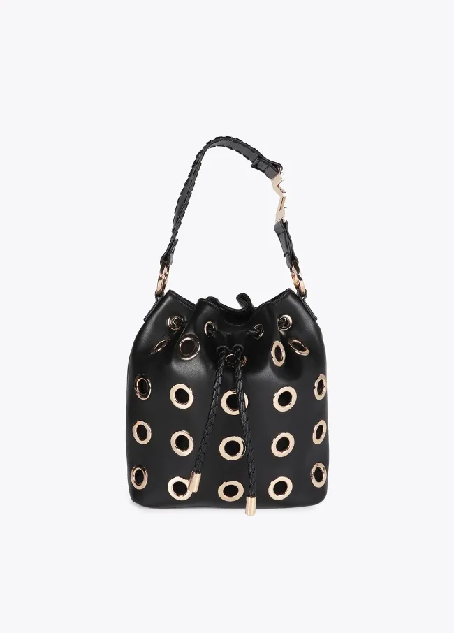 Pouch bag with circular metallic eyelets
