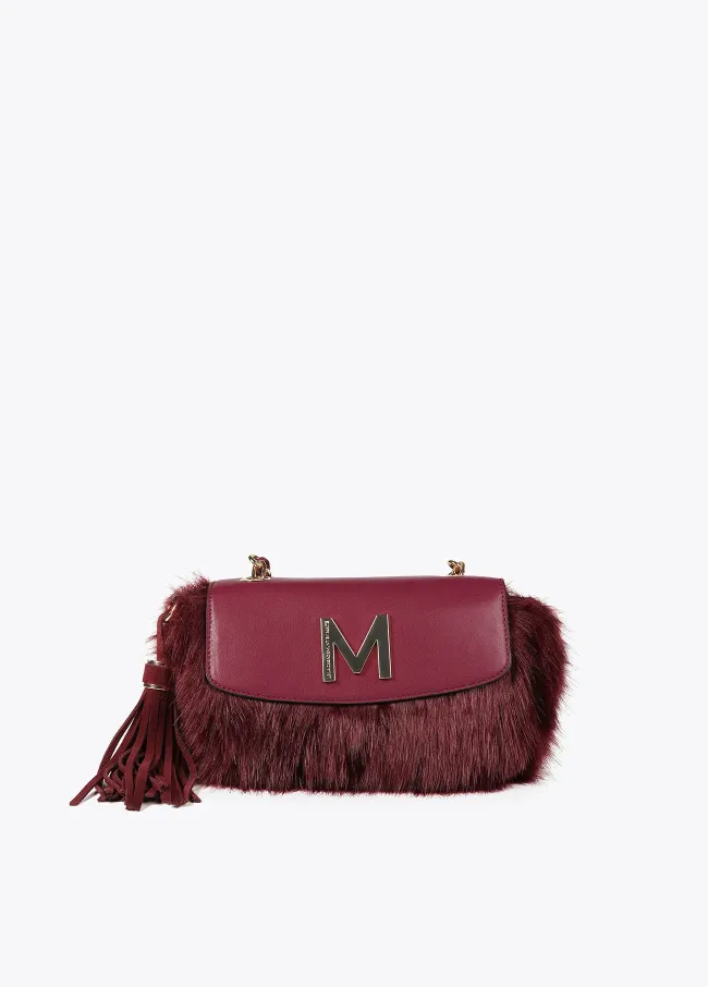 Faux fur crossbody bag with faux leather flap