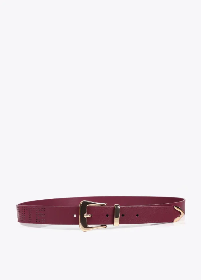 Belt with knot and cutwork logo