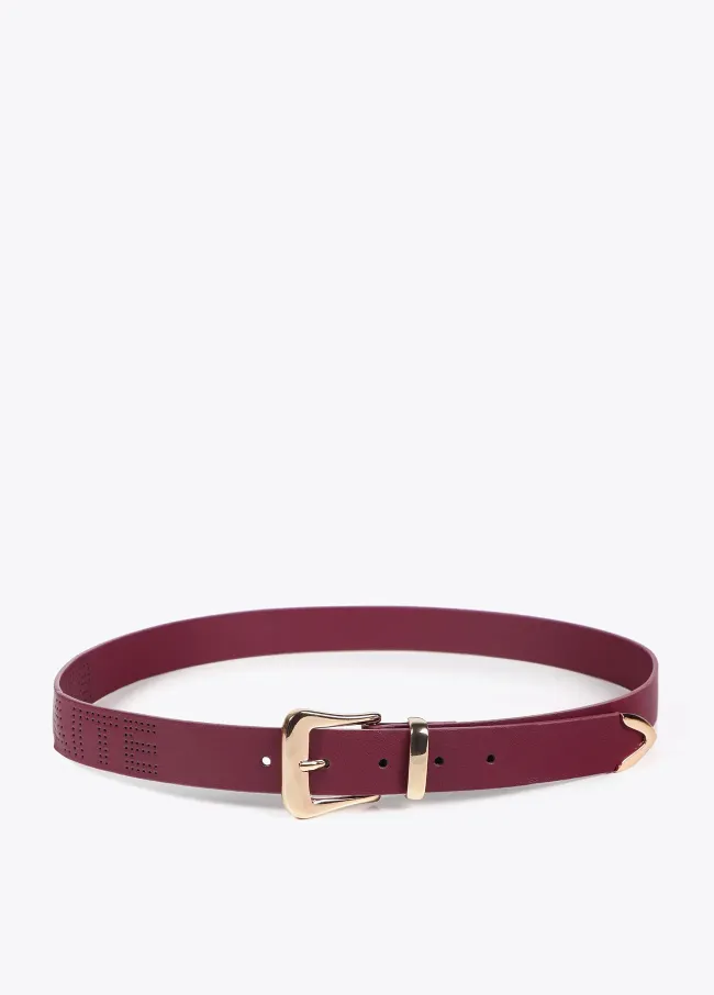 Belt with knot and cutwork logo