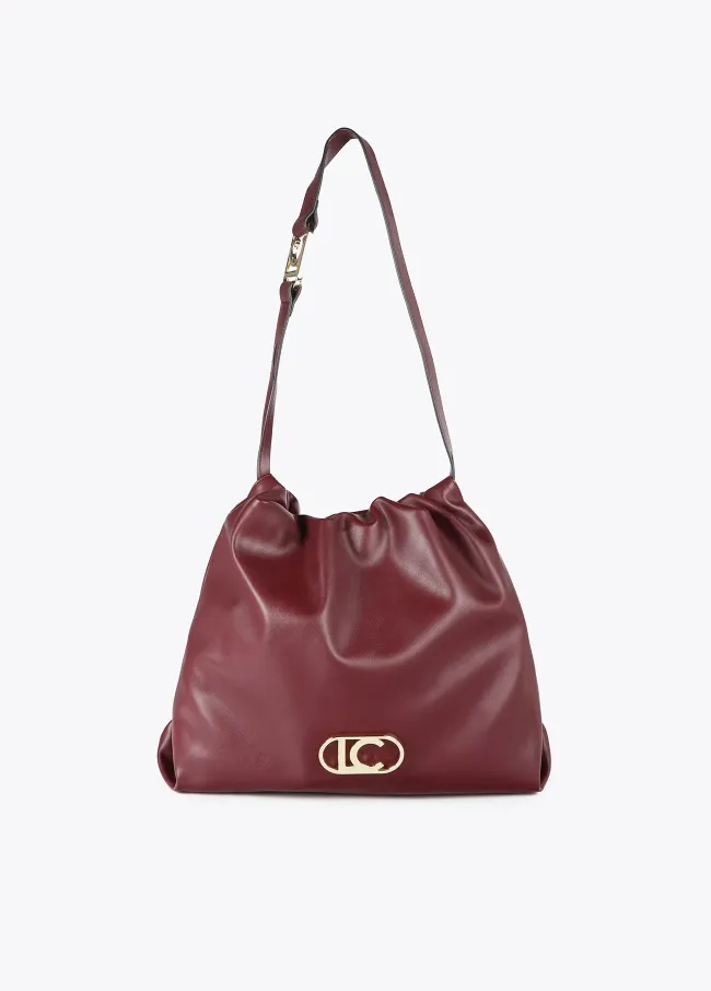 Faux leather tote bag with oval LC logo.
