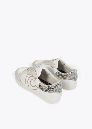 Deportiva con detalles en efecto serpiente y piel