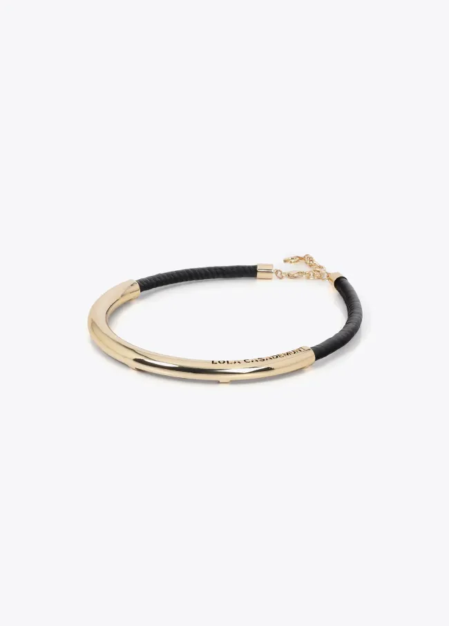 Short faux leather tube necklace with cutwork...