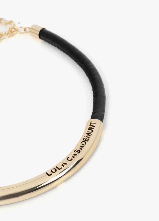 Short faux leather tube necklace with cutwork...