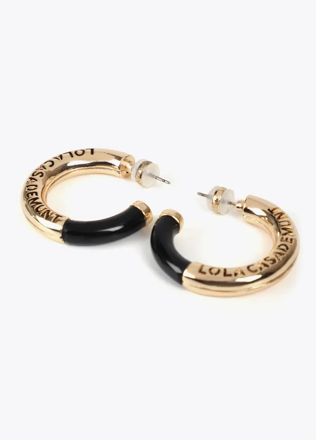 Acrylic tube earrings with cutwork metal logo