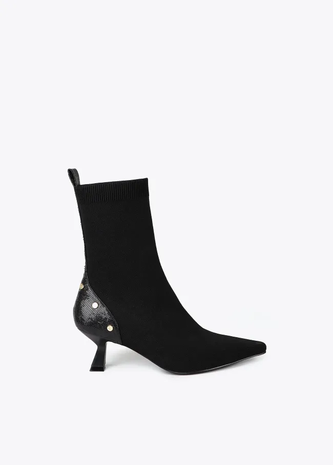 Sock-style ankle boots with snakeskin print...