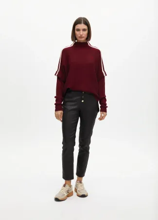 Waxed flared trousers