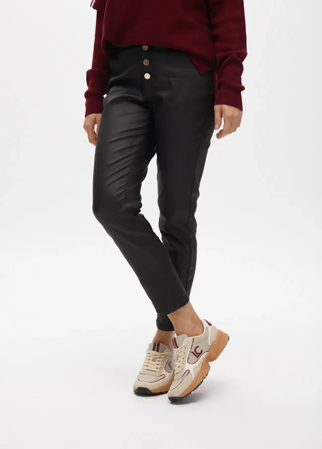 Waxed flared trousers