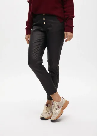 Waxed flared trousers