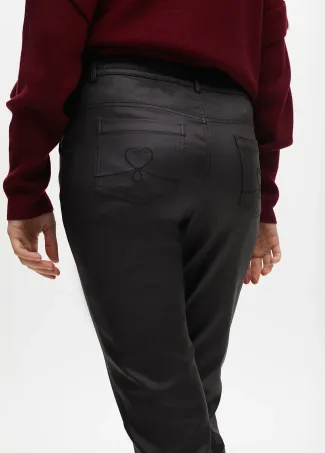 Waxed flared trousers