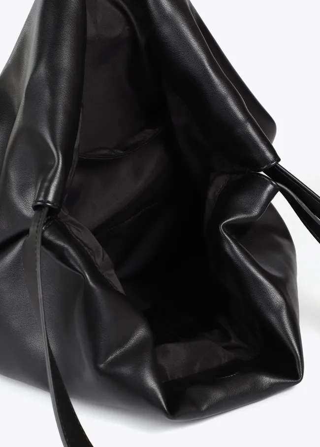 Faux leather tote bag with oval LC logo.