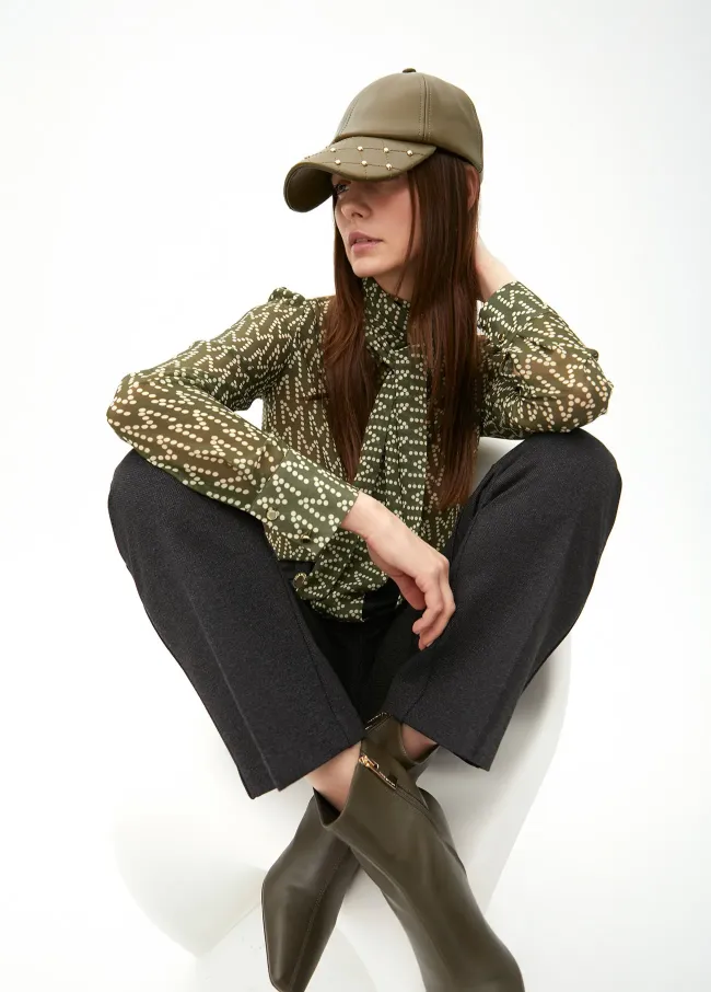 Leather-effect cap with stud detail