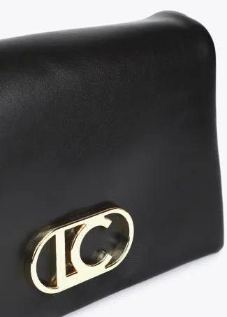 Faux leather crossbody bag with three compartments and flap.