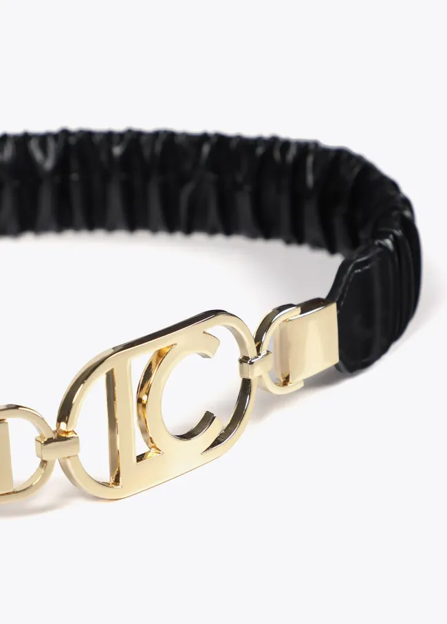 Stretch faux leather belt with oval logo