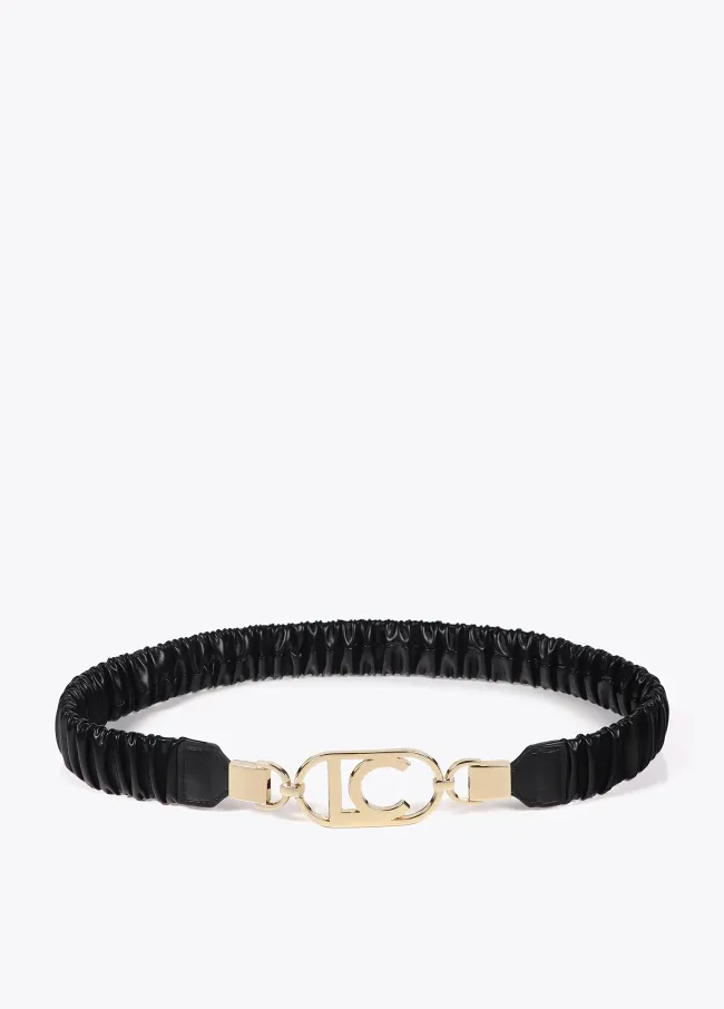 Stretch faux leather belt with oval logo