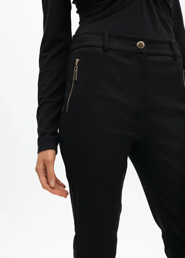 Stretch fabric trousers with zipped pocket