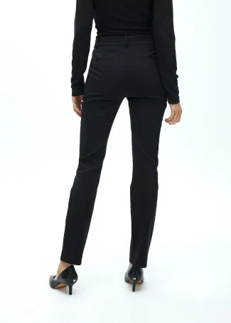 Stretch fabric trousers with zipped pocket
