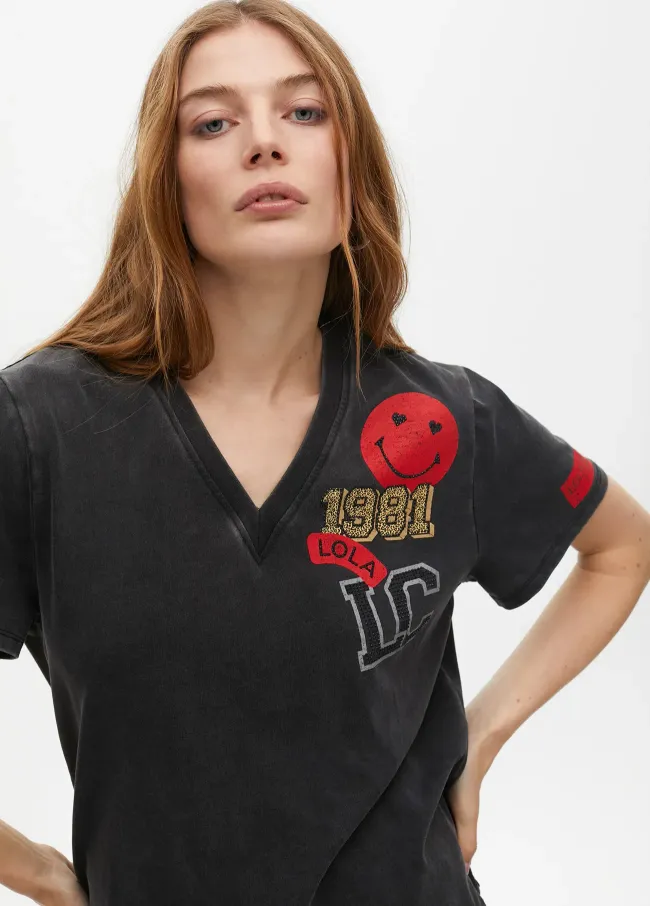 Camiseta manga corta  detalle parches en tejido...