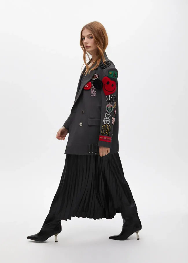 Falda plisada efecto encerada