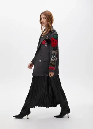 Falda plisada efecto encerada