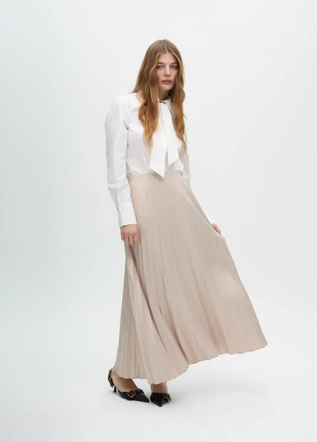 Pleated waxed-effect skirt