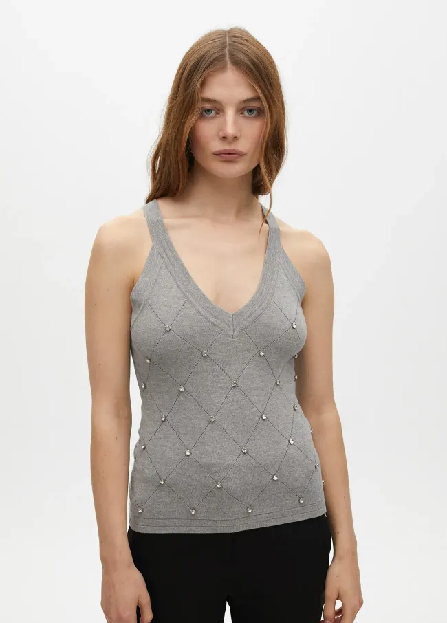 Top with rhinestone detail