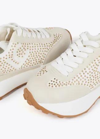 Platform trainers with metallic studs