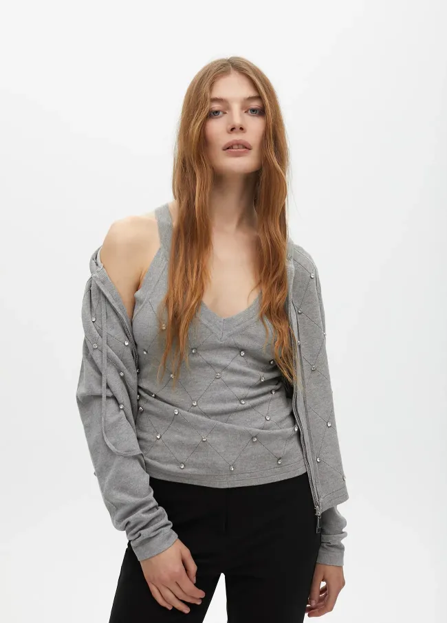 Cardigan punto cremallera detalle pedrería