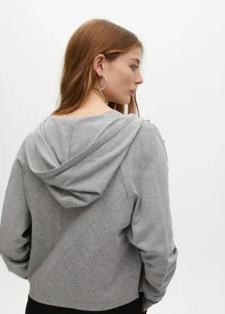 Cardigan punto cremallera detalle pedrería