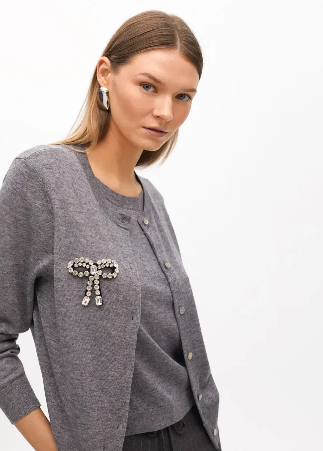 Two-piece cardigan with rhinestone bow