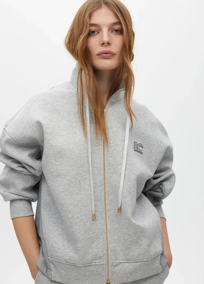 Sweatshirt with zip opening and side detail