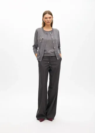 Two-piece cardigan with rhinestone bow