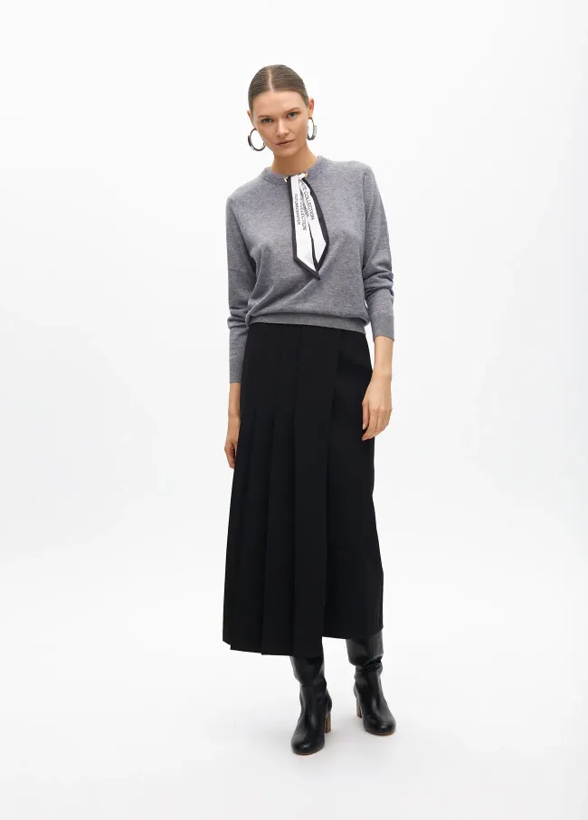 Sweater with scarf detail at the neck