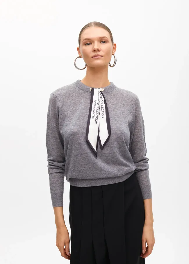 Sweater with scarf detail at the neck